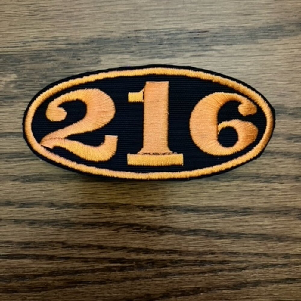 216 area code proud orange and black oval embroidered patch